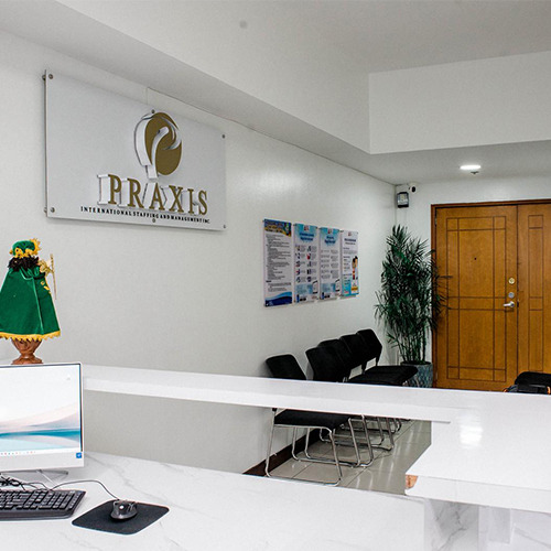 Praxis International reception with company logo